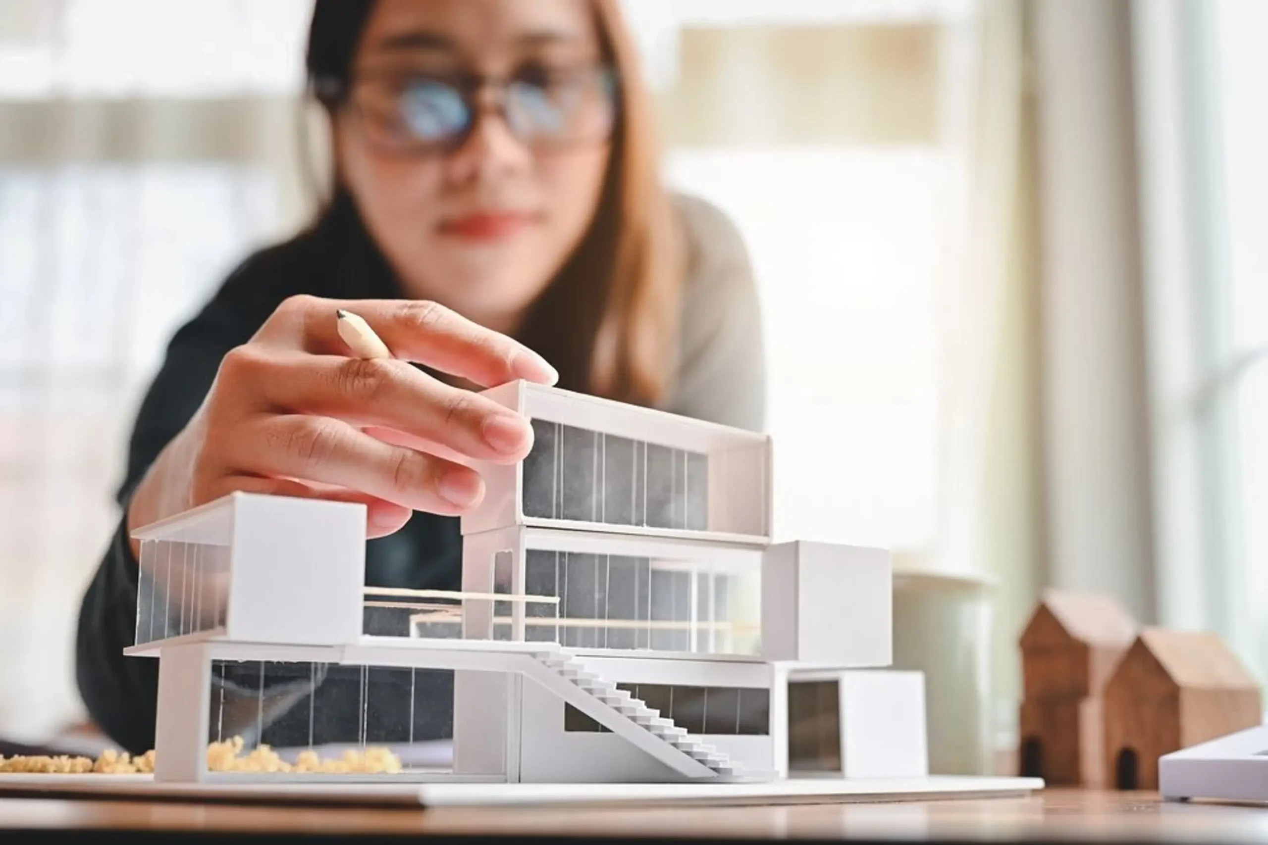 An architect creating a building model